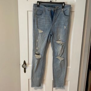 Mid Rise Ripped Jeans size 12